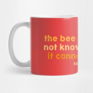 the bee does not know that it cannot fly Mug